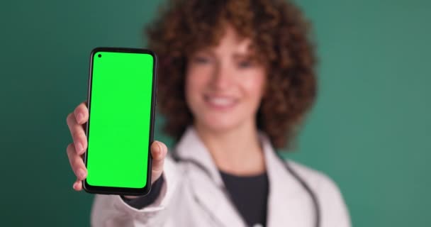 Real Time Static Shot Blurred Smiling Crop Young Female Doctor — Stock Video