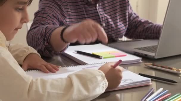 Video Grandfather Helping Granddaughter Homework While Working Laptop Home — Stock Video