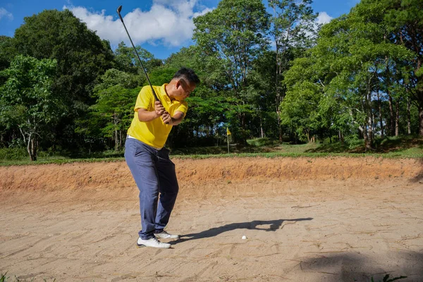 Asian Golfer Swings Sand Pit Pre Match Practice Golf Course — Stockfoto