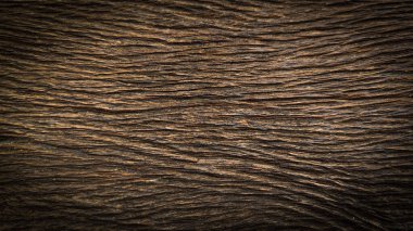 Kaliteli ahşap dokuyu kapat. El yapımı eski ahşap masa. Fırça makinesiyle yapılmış. Eski ahşap, tahta yüzey arka planı