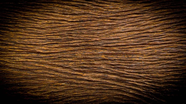 Kaliteli ahşap dokuyu kapat. El yapımı eski ahşap masa. Fırça makinesiyle yapılmış. Eski ahşap, tahta yüzey arka planı