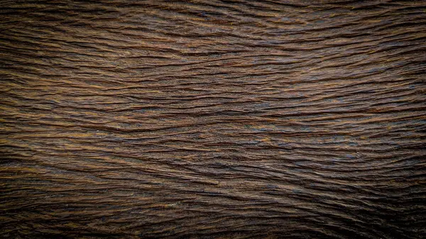 Kaliteli ahşap dokuyu kapat. El yapımı eski ahşap masa. Fırça makinesiyle yapılmış. Eski ahşap, tahta yüzey arka planı