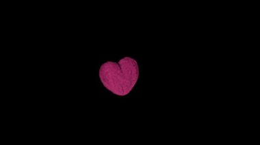 Fuzzy Hairy Pink Heart Tumbling In To Camera With Falling Heart Particles.