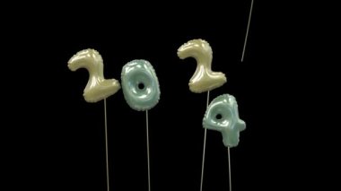 Yeni yıl Balonu 2023 uçup gidiyor ve 2024 hala sarı ve yeşil.