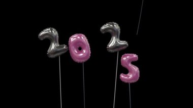 Renkli yeni yıl balonu 2024 yazarken 4 'ü uçuyor, 5' i ise 2025 siyah ve pembe şeklinde yüzüyor.