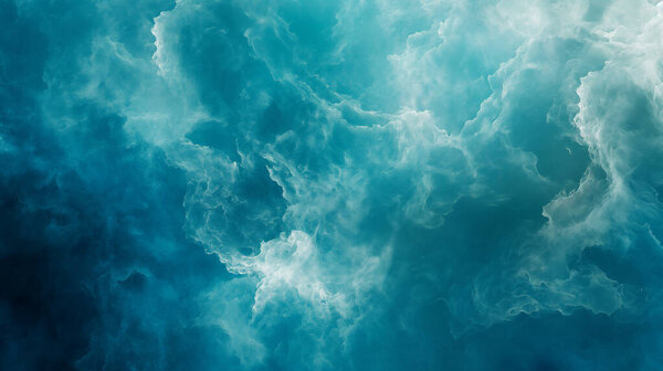 Воздушный вид бурных океанских вод, захватывающий неземную красоту вихревых голубых тонов и белой морской пены, создающий абстрактную и мечтательную визуальную текстуру.