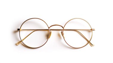 Round gold-framed eyeglasses with a minimalist design, laid flat on a white background. clipart