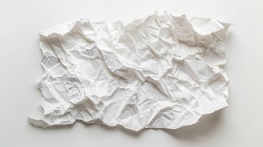 Buruşmuş beyaz kağıt boş bir tuval üzerinde yatıyor. Yaratıcı girişimlerin ve kusurun güzelliğinin bir kanıtı..