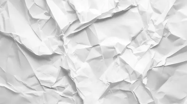 stock image Crumpled white paper with deep creases creating a rough, irregular pattern.