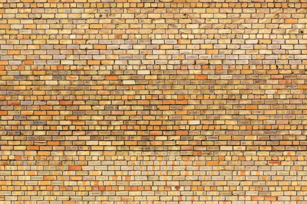 欧洲城市的黄橙色砖墙作为背景13 — 图库照片