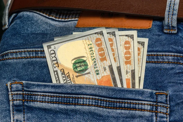 100 dollar pocket money, in jeans pocket, 100 dollar bills 1