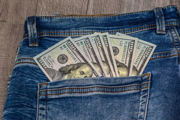 100 dollar pocket money, in jeans pocket, 100 dollar bills 4