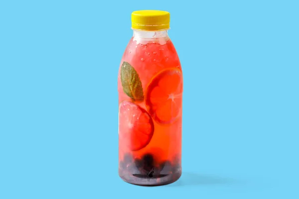 Bubble gum lemonade with currants, lime, mint, bubble gum syrup, ice, soda water on blue background for food delivery website 1