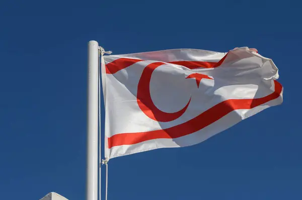 stock image Northern Cyprus flag against blue sky 2