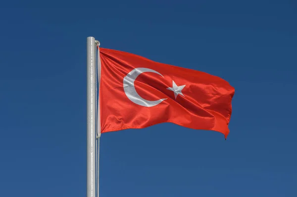 Turkey flag against blue sky