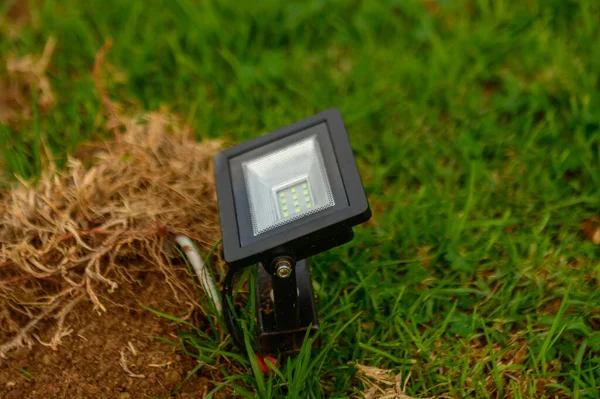 LED lamp on the lawn in a residential complex 1