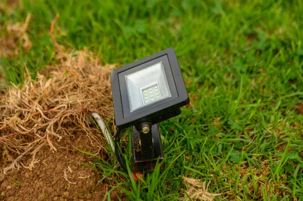 LED lamp on the lawn in a residential complex
