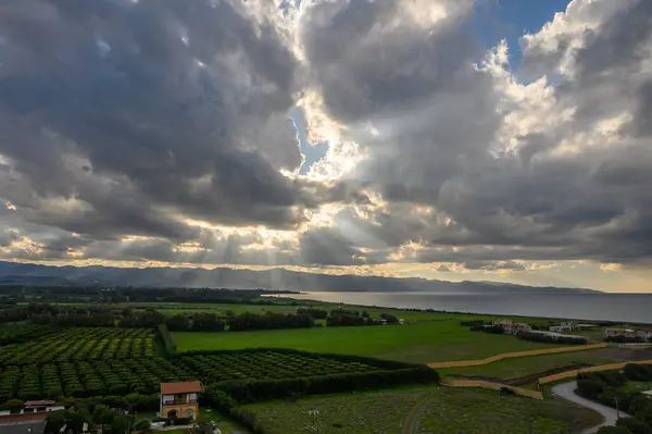 clouds and sun rays over the Mediterranean sea and mountains in winter in Cyprus 3