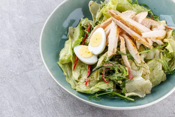 Unagi chicken salad with chicken fillet and quail eggs for the food delivery website 3