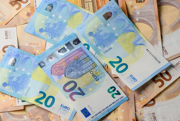 pile of paper euro banknotes as part of the united country's payment system 5