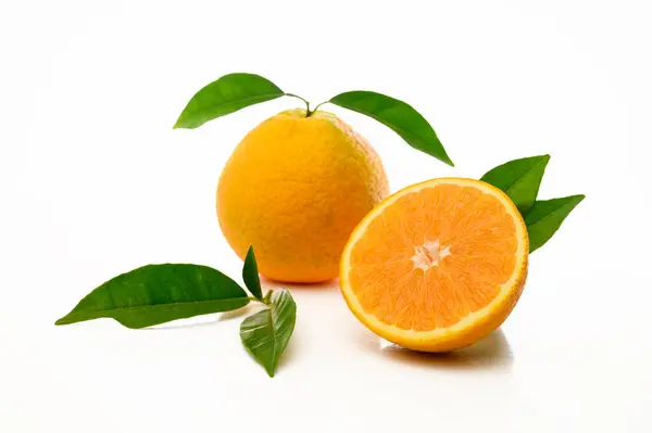 stock image Fresh orange fruit whole and slices