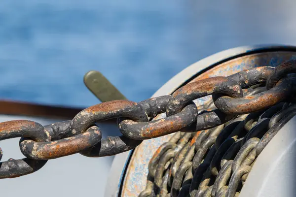 Rusty anchor chain on a boat