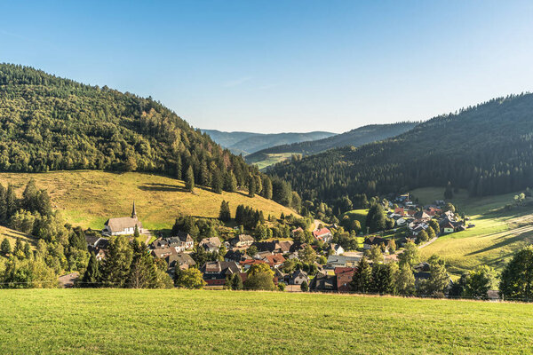 View of the village of Muggenbrunn near Todtnau and the forested Black Forest mountains, Southern Black Forest, Black Forest, Baden-Wuerttemberg, Germany