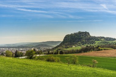 View of the Hegau volcano Hohentwiel and the city of Singen, Hilzingen, Baden-Wuerttemberg, Germany clipart