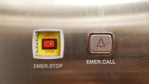 Emergency stop and emergency call buttons