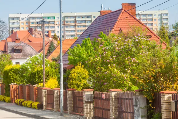 stock image Poland, Upper Silesia, Katowice, Giszowiec District, Ancient and Modern Housing of Staszic developement sunlit in spring