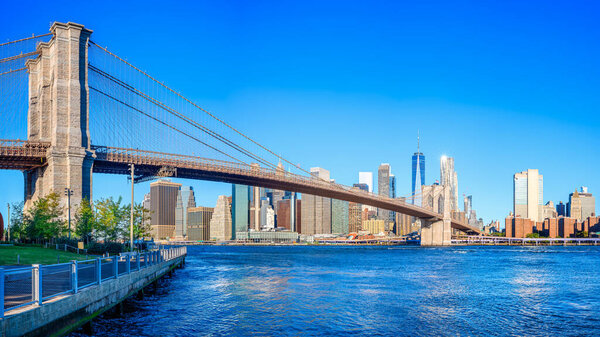 The skyline of new york under a blue sky