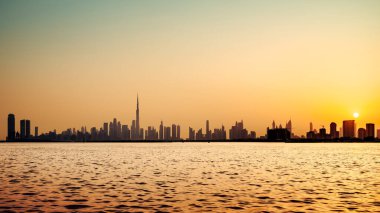 thze skyline of dubai during sunset