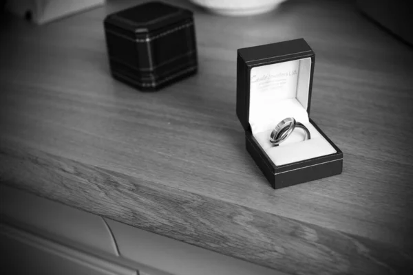 wedding rings in small box, black and white