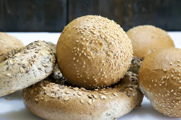 stock image fresh baked buns with sunflower seeds. 