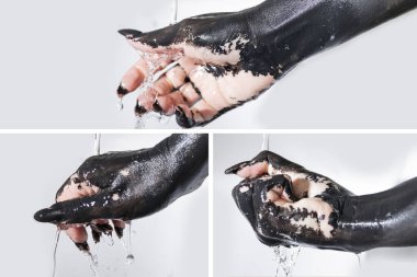 Siyah elli, uzun tırnaklı, temiz ve musluktan akan suyla boyanmış fotoğraflar. Boyalı elle konsept fotoğraf