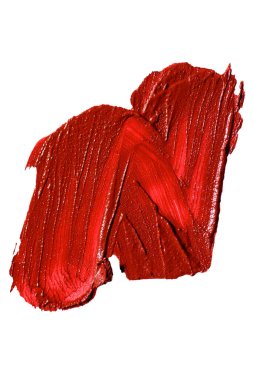 Red lipstick smear smudge swatch isolated on white background. Cream makeup texture. Bright color cosmetic product brush stroke swipe sample.