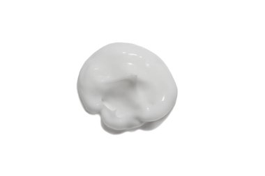 White smear of cosmetic cream isolated on white background, foundation texture.