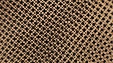 Geçmişe dönük soyut arkaplan. Noktalı ekranların gerçek videosu. Açık kahverengi ve siyah noktalar