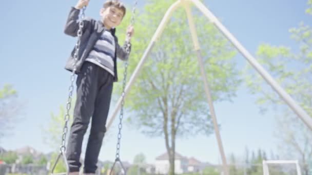 School Boy Swing Park Cute Kid Having Fun Swinging Spring — Stock Video