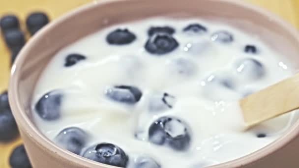 Wooden Spoon Yogurt Blueberries Wooden Background Breakfast Eating Healthy Food — Stock Video