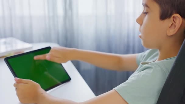 Close Hands Kid Holding Tapping Tablet Computer Horizontal Green Screen — Stock Video