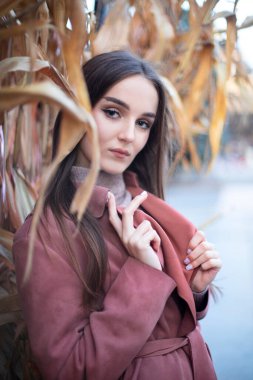 Portrait of model girl with hands. Young girl.