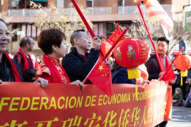 Representatives of the Chinese Economic Organization at the parade. The Chinese celebrate the Chinese New Year in Spain, Barcelona 01.25.2025 clipart