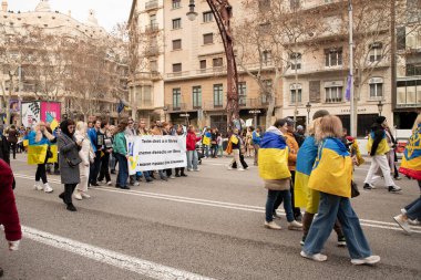 Europeans and other nationalities with Ukrainians came out in support of the rally of Ukraine with national symbols. Three years of russia's war with ukraine. Spain Barcelona 23.02.2025 clipart