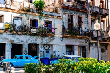 Timeless beauty of Old Havana captured in cobblestone streets, iconic vintage cars, and colorful colonial architecture clipart