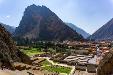 Ollantaytambo ruins showcasing intricate stone terraces and Inca architecture in the heart of Peru Sacred Valley clipart