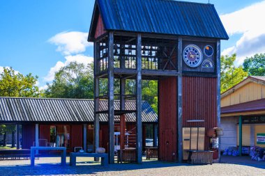Ventspils. Clock on the Market Square.As the central object of the reconstructed market, a bell tower with a clock was installed, which symbolizes the unfulfilled dream of the former leaders of the city - to put the central clock of the city.