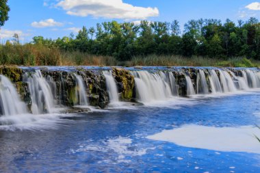 Kuldiga. Ventas-Rumba waterfall.The widest waterfall in Europe (249 m), of natural nature, a number of legends and historical events are associated with the waterfall.