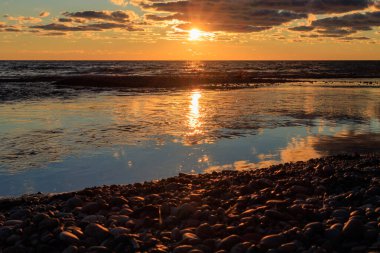 Uzhava.Latvia.Sunset on the Baltic Sea.