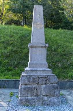 Monument dedicated to France Preseren, erected by the Ljubljana literary club in 1883, stands in the park Bled. Slovenia. clipart